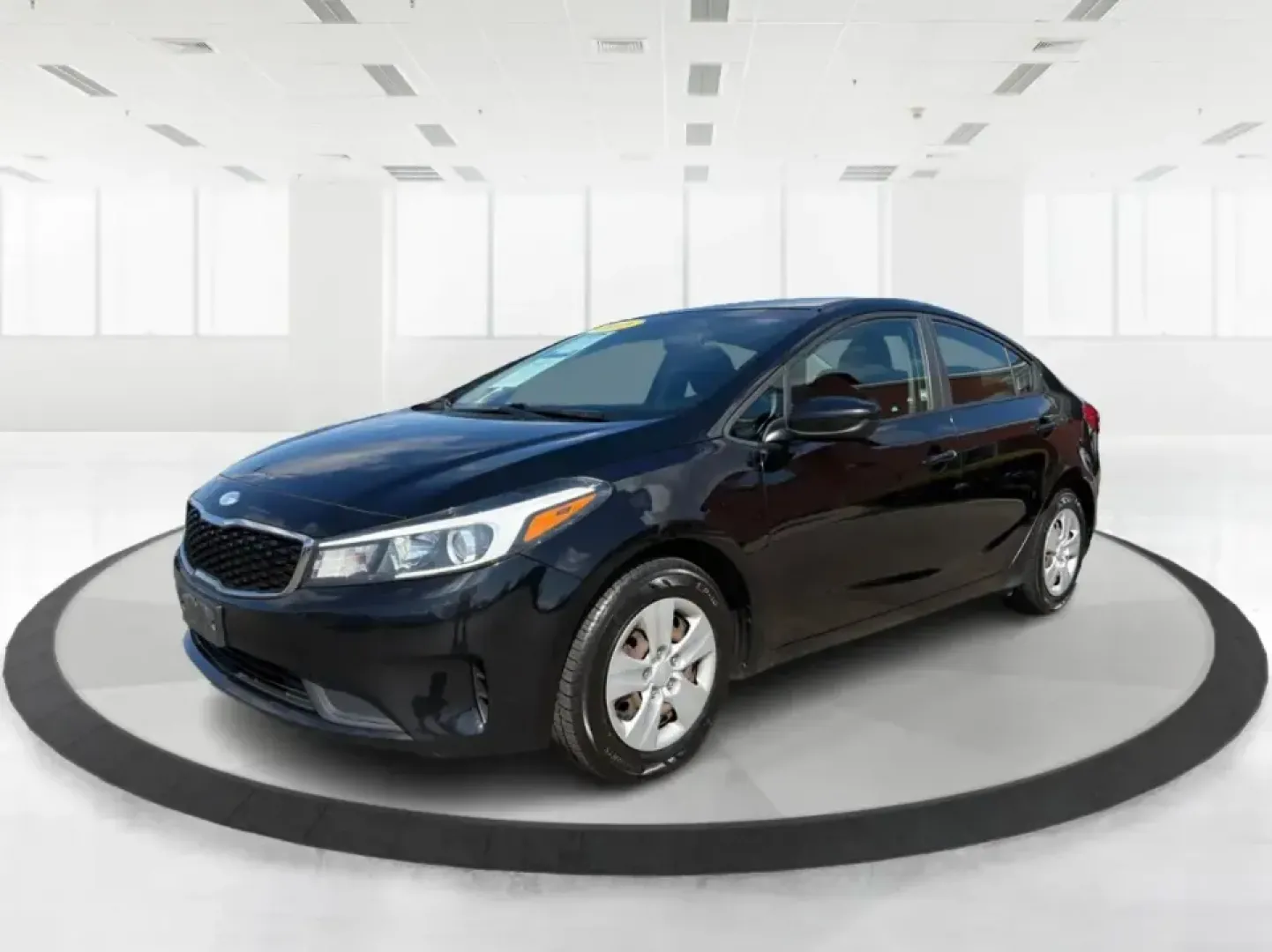 2018 Kia Forte LX (3KPFK4A79JE) with an 2L I-4 DOHC engine, 6M transmission, located at 401 Woodman Dr, Riverside, OH, 45431, (937) 908-9800, 39.760899, -84.123421 - Need a dependable commuter that's easy to park downtown, comfortable for I-75 and SR-725 traffic, and still stylish enough for dinner in the Dayton area? This 2018 Kia Forte LX in Aurora Black is a smart, budget-friendly sedan that fits real life in Moraine, OH-whether you're stacking miles for work - Photo#8