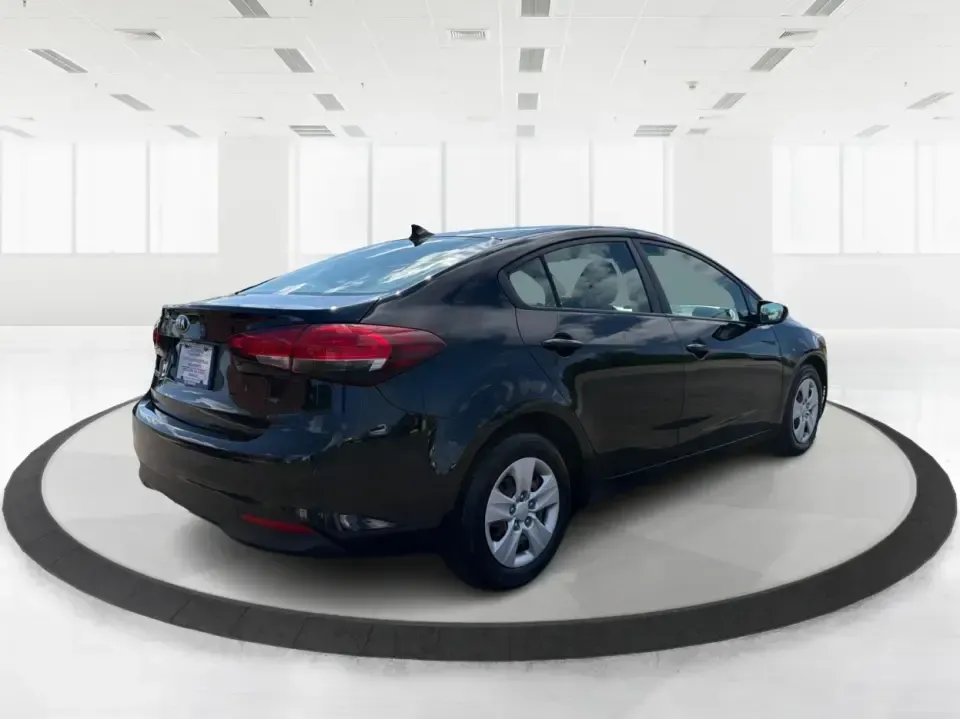 2018 Kia Forte LX (3KPFK4A79JE) with an 2L I-4 DOHC engine, 6M transmission, located at 880 E. National Road, Vandalia, OH, 45377, (937) 908-9800, 39.891918, -84.183594 - Need a dependable commuter that's easy to park downtown, comfortable for I-75 and SR-725 traffic, and still stylish enough for dinner in the Dayton area? This 2018 Kia Forte LX in Aurora Black is a smart, budget-friendly sedan that fits real life in Moraine, OH-whether you're stacking miles for work - Photo#2