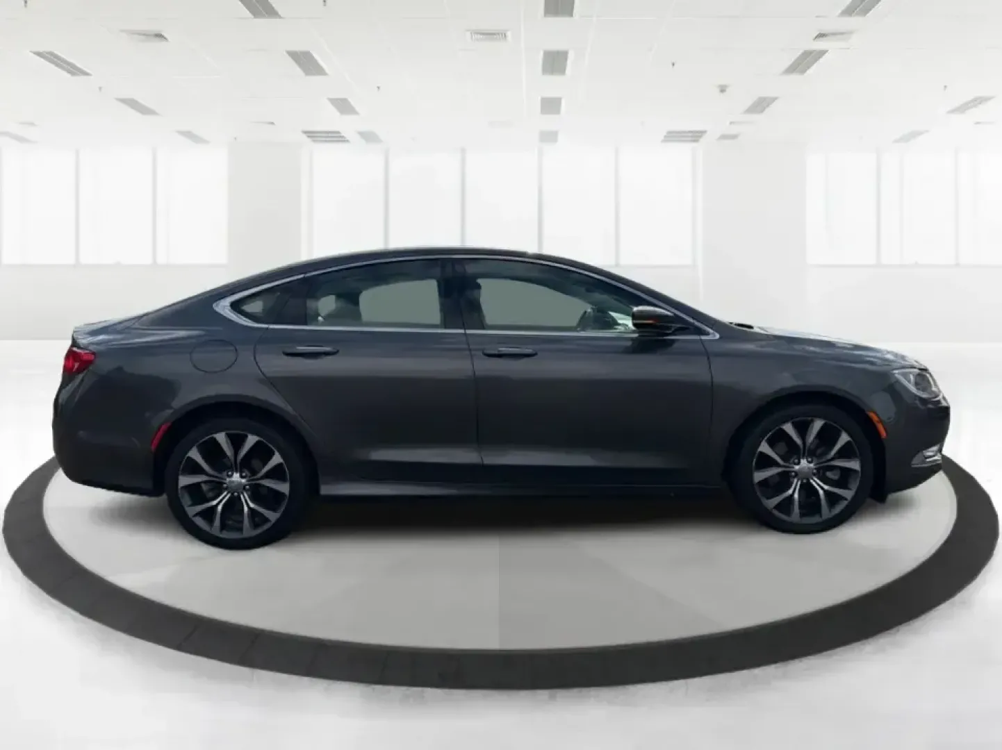 2015 Chrysler 200 C (1C3CCCCG7FN) with an 3.6L V6 DOHC 24V FFV engine, 9-Speed Automatic transmission, located at 880 E. National Road, Vandalia, OH, 45377, (937) 908-9800, 39.891918, -84.183594 - Set up for real life in the Miami Valley-school drop-offs, a long commute down I75, and comfortable weekend getaways-this 2015 Chrysler 200 C is the kind of midsize sedan that fits a busy schedule without feeling basic. With its smooth ride, strong V6 power, and upscale comfort features, it's a smar - Photo#1