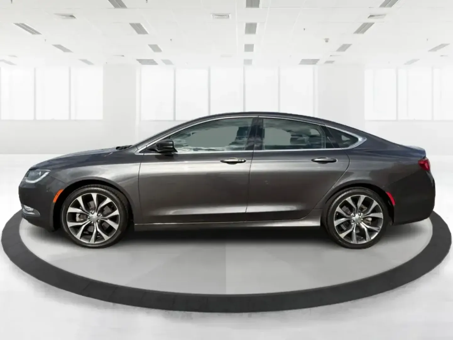 2015 Chrysler 200 C (1C3CCCCG7FN) with an 3.6L V6 DOHC 24V FFV engine, 9-Speed Automatic transmission, located at 880 E. National Road, Vandalia, OH, 45377, (937) 908-9800, 39.891918, -84.183594 - Set up for real life in the Miami Valley-school drop-offs, a long commute down I75, and comfortable weekend getaways-this 2015 Chrysler 200 C is the kind of midsize sedan that fits a busy schedule without feeling basic. With its smooth ride, strong V6 power, and upscale comfort features, it's a smar - Photo#5