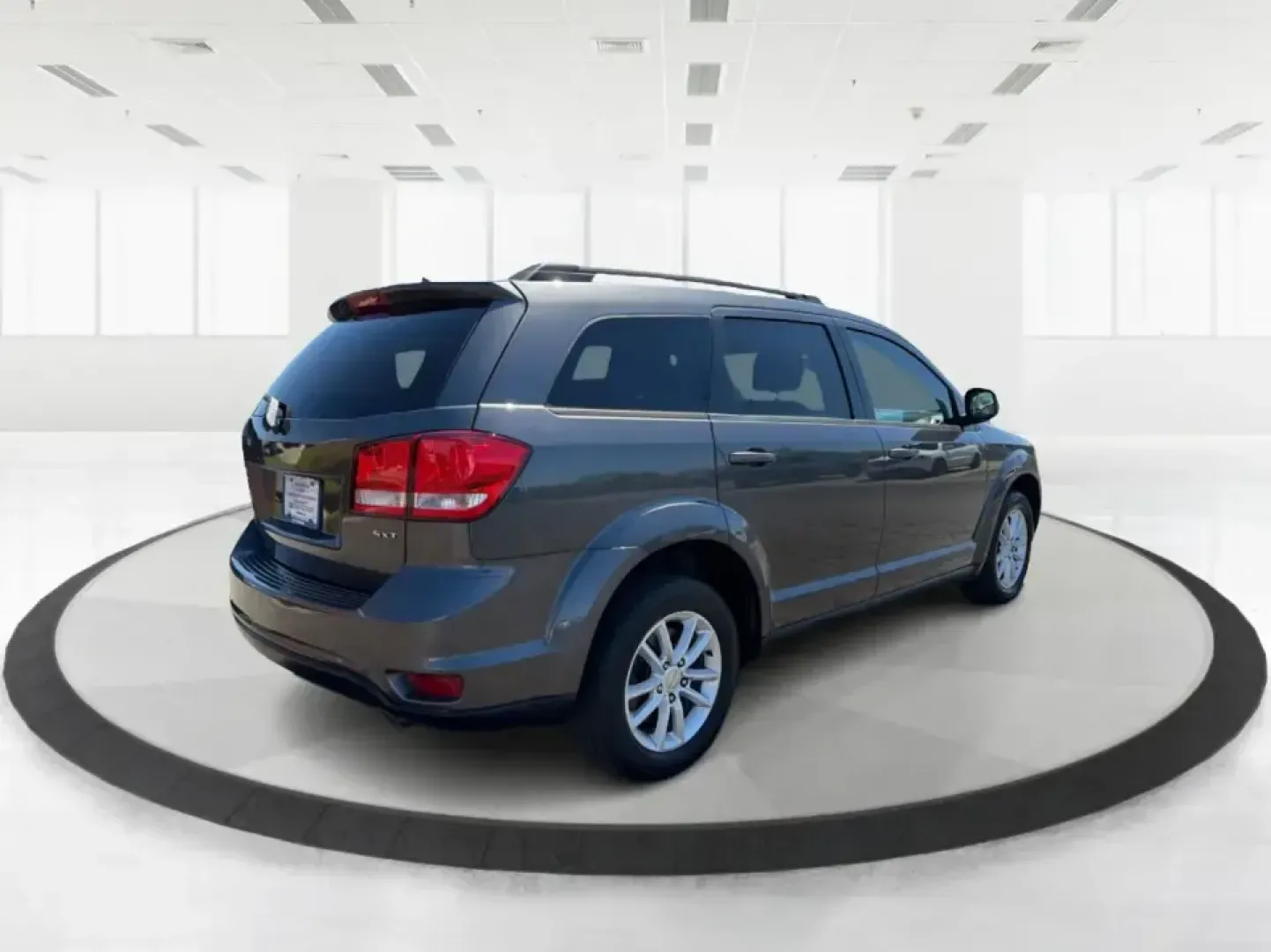 2014 Dodge Journey SXT (3C4PDDBG0ET) with an 3.6L V-6 DOHC engine, 6-Speed Automatic transmission, located at 1099 N County Rd 25A, Troy, OH, 45373, (937) 908-9800, 40.057079, -84.212883 - Pack up the kids, the dog, and the weekend bags-this 2014 Dodge Journey SXT is the kind of SUV that makes everyday life in Troy easier and spontaneous road trips feel completely doable. Whether you're tackling school drop-offs, commuting to Dayton, or planning a family day at the Miami County Fairgr - Photo#2