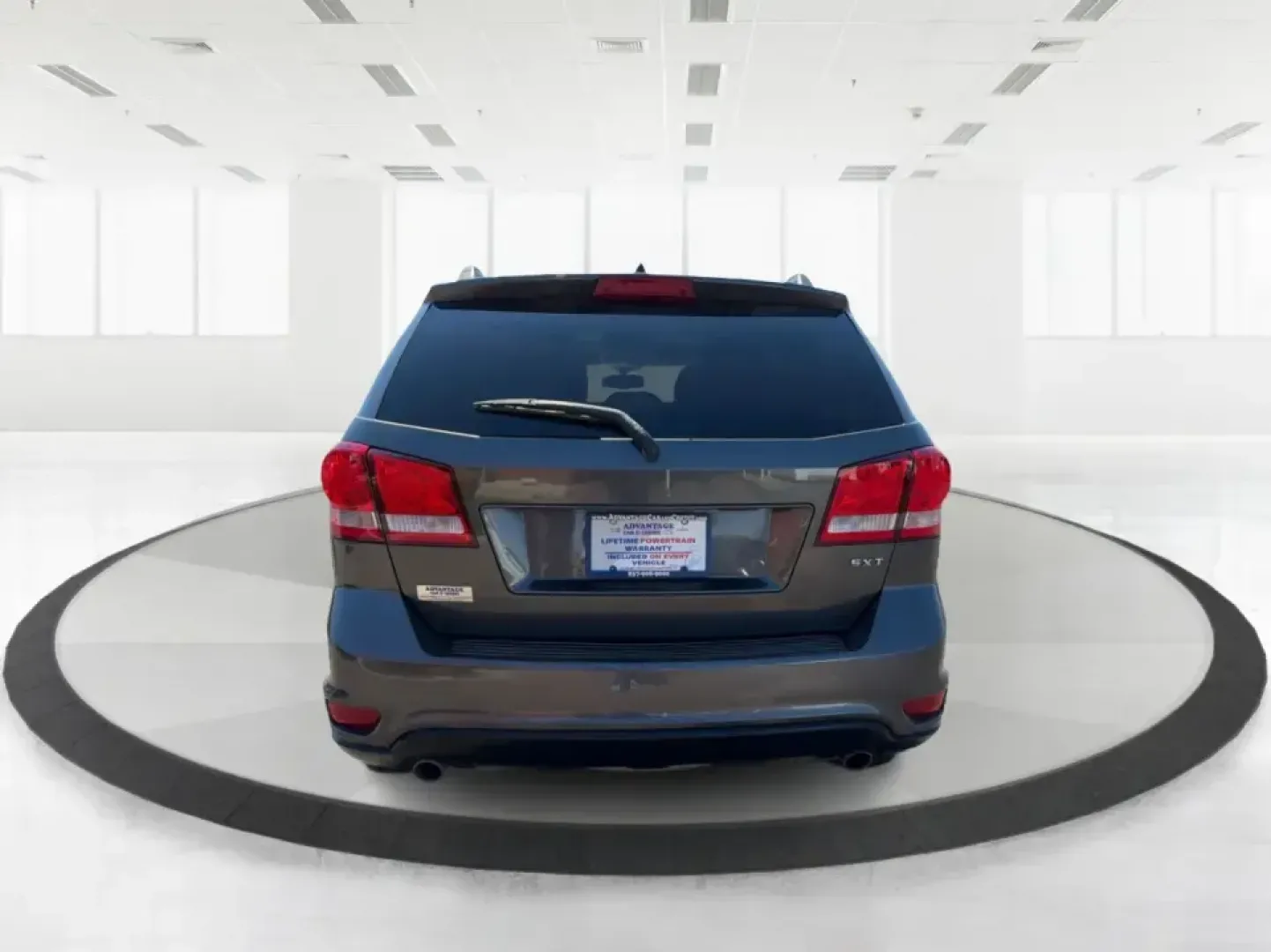 2014 Dodge Journey SXT (3C4PDDBG0ET) with an 3.6L V-6 DOHC engine, 6-Speed Automatic transmission, located at 1099 N County Rd 25A, Troy, OH, 45373, (937) 908-9800, 40.057079, -84.212883 - Pack up the kids, the dog, and the weekend bags-this 2014 Dodge Journey SXT is the kind of SUV that makes everyday life in Troy easier and spontaneous road trips feel completely doable. Whether you're tackling school drop-offs, commuting to Dayton, or planning a family day at the Miami County Fairgr - Photo#3