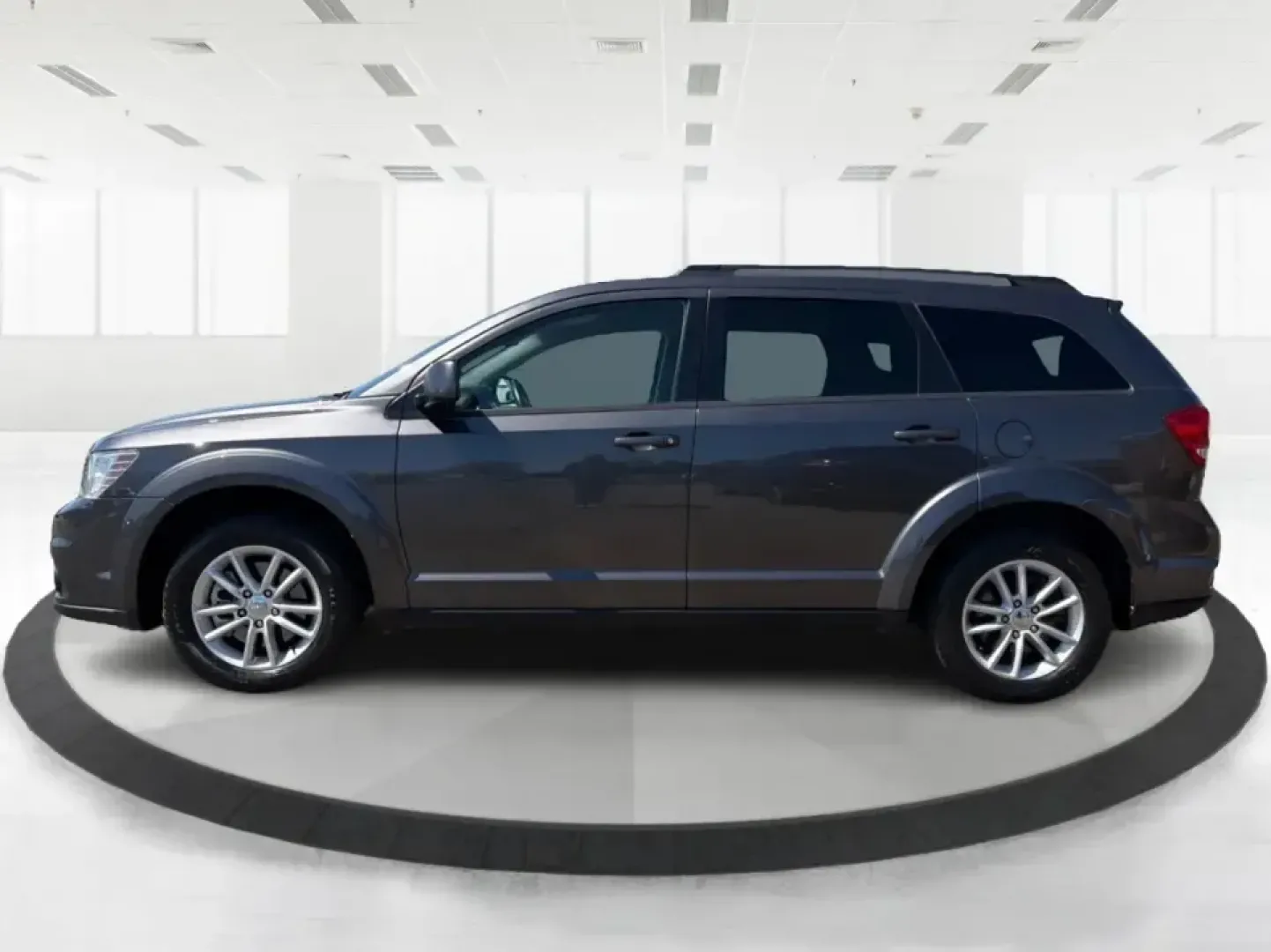 2014 Dodge Journey SXT (3C4PDDBG0ET) with an 3.6L V-6 DOHC engine, 6-Speed Automatic transmission, located at 1099 N County Rd 25A, Troy, OH, 45373, (937) 908-9800, 40.057079, -84.212883 - Pack up the kids, the dog, and the weekend bags-this 2014 Dodge Journey SXT is the kind of SUV that makes everyday life in Troy easier and spontaneous road trips feel completely doable. Whether you're tackling school drop-offs, commuting to Dayton, or planning a family day at the Miami County Fairgr - Photo#5