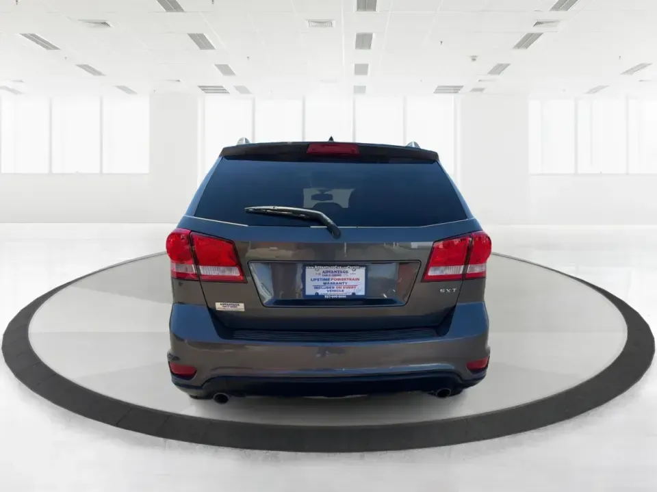 2014 Dodge Journey SXT (3C4PDDBG0ET) with an 3.6L V-6 DOHC engine, 6-Speed Automatic transmission, located at 1184 Kauffman Ave, Fairborn, OH, 45324, (937) 908-9800, 39.807072, -84.030914 - Pack up the kids, the dog, and the weekend bags-this 2014 Dodge Journey SXT is the kind of SUV that makes everyday life in Troy easier and spontaneous road trips feel completely doable. Whether you're tackling school drop-offs, commuting to Dayton, or planning a family day at the Miami County Fairgr - Photo#3