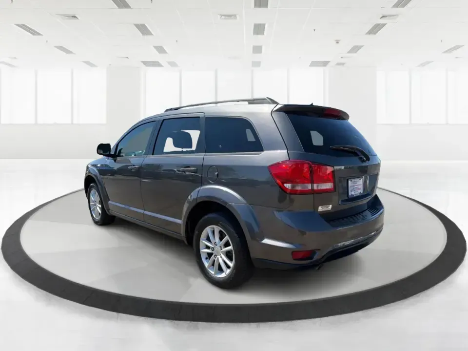 2014 Dodge Journey SXT (3C4PDDBG0ET) with an 3.6L V-6 DOHC engine, 6-Speed Automatic transmission, located at 1184 Kauffman Ave, Fairborn, OH, 45324, (937) 908-9800, 39.807072, -84.030914 - Pack up the kids, the dog, and the weekend bags-this 2014 Dodge Journey SXT is the kind of SUV that makes everyday life in Troy easier and spontaneous road trips feel completely doable. Whether you're tackling school drop-offs, commuting to Dayton, or planning a family day at the Miami County Fairgr - Photo#4