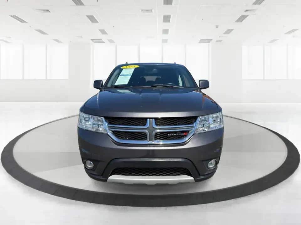 2014 Dodge Journey SXT (3C4PDDBG0ET) with an 3.6L V-6 DOHC engine, 6-Speed Automatic transmission, located at 1184 Kauffman Ave, Fairborn, OH, 45324, (937) 908-9800, 39.807072, -84.030914 - Pack up the kids, the dog, and the weekend bags-this 2014 Dodge Journey SXT is the kind of SUV that makes everyday life in Troy easier and spontaneous road trips feel completely doable. Whether you're tackling school drop-offs, commuting to Dayton, or planning a family day at the Miami County Fairgr - Photo#7