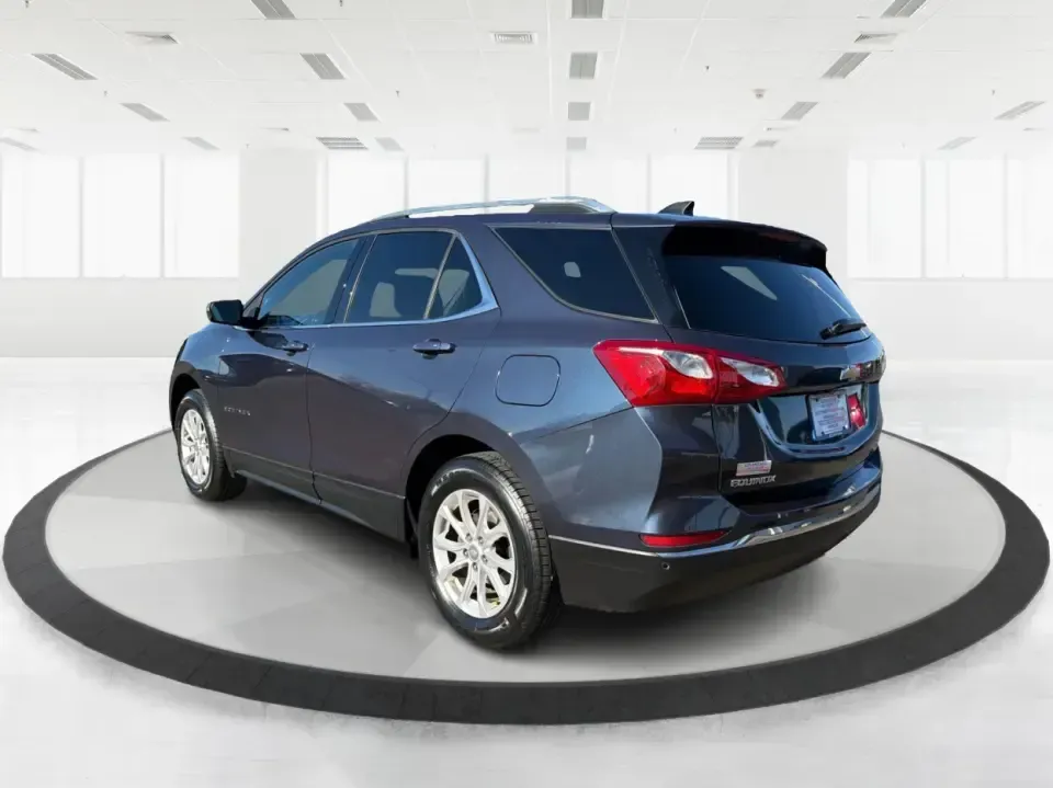 2018 Chevrolet Equinox LT (3GNAXSEV1JL) with an 1.5L I-4 gasoline direct injection engine, 6A transmission, located at 8750 N County Rd 25A, Piqua, OH, 45356, (937) 908-9800, 40.164391, -84.232513 - Picture your next Ohio road trip: a comfortable SUV loaded with gear, the kids settled in, and the confidence to keep going when the weather turns or the route heads off the main road. This 2018 Chevrolet Equinox LT in Storm Blue Metallic is built for real life in and around Piqua-whether you're com - Photo#4