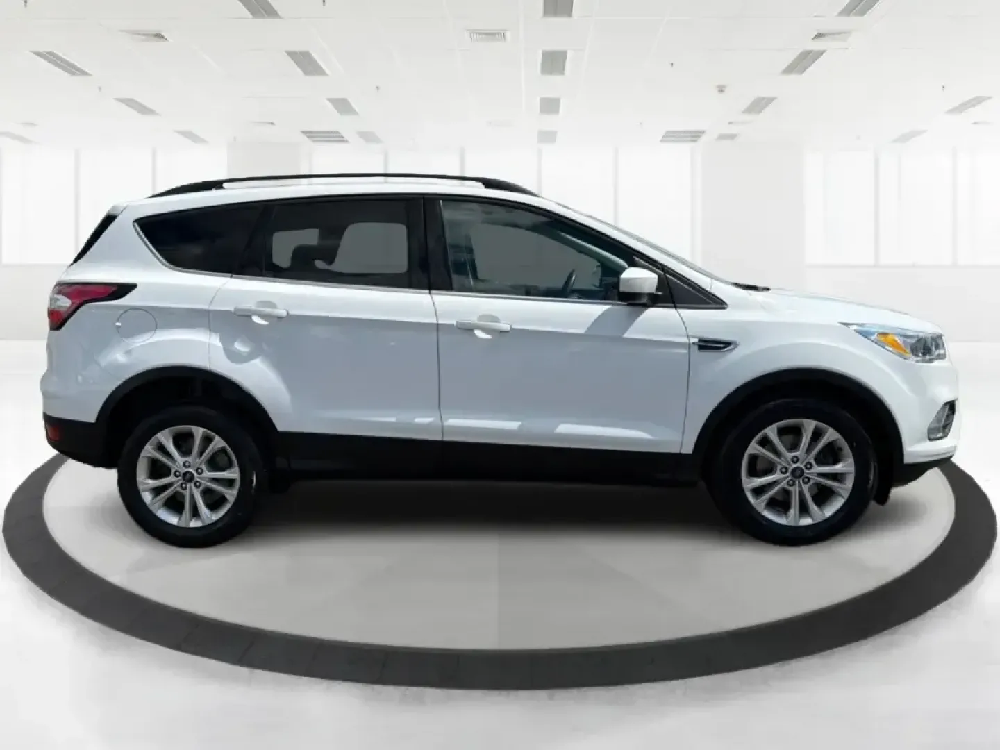 2018 Ford Escape SE (1FMCU0GD2JU) with an 1.5L L4 DOHC 16V engine, 6A transmission, located at 1951 S Dayton Lakeview Rd., New Carlisle, OH, 45344, (937) 908-9800, 39.890999, -84.050255 - Picture your next easy-to-live-with SUV: something that handles weekday commutes down I70, last-minute grocery runs near Brandt Pike, and weekend getaways to Buck Creek State Park without draining your budget. This 2018 Ford Escape SE is built for real life in Clark County-comfortable, efficient, an - Photo#1