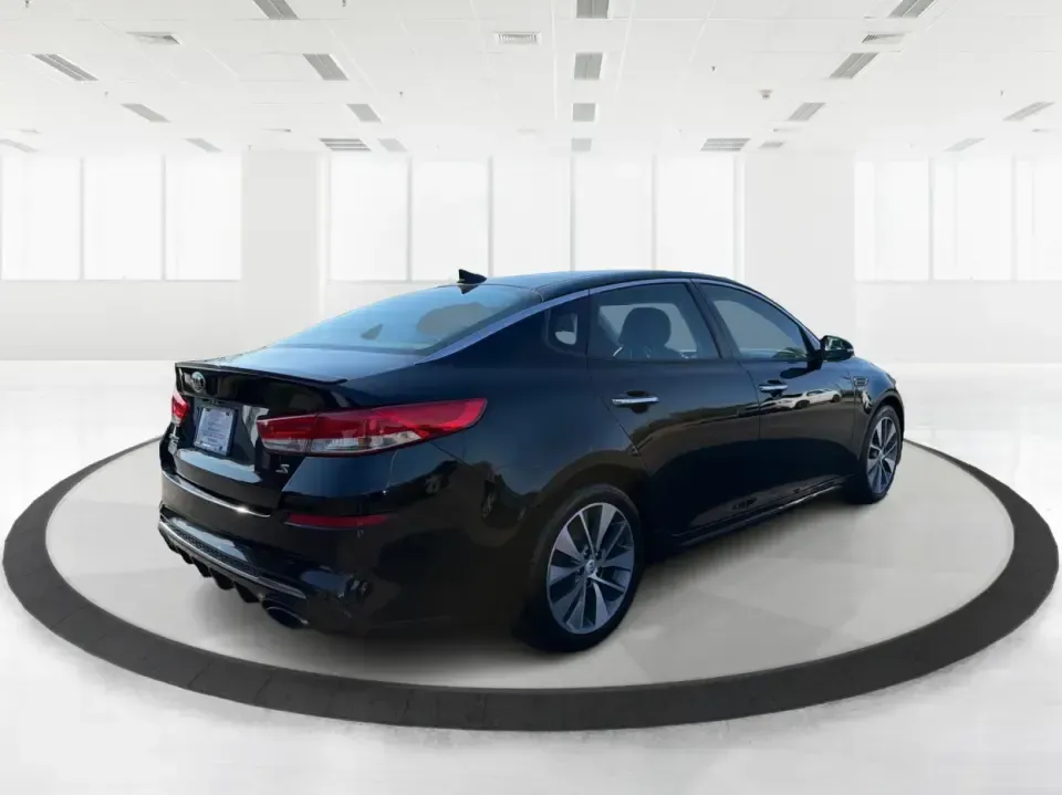2019 Kia Optima S (5XXGT4L37KG) with an Theta II 2.4L I-4 gasoline direct injection engine, 6A transmission, located at 1099 N County Rd 25A, Troy, OH, 45373, (937) 908-9800, 40.057079, -84.212883 - Need a reliable commuter that still feels stylish for date night downtown, comfortable for weekend trips to Dayton, and efficient for the daily run up I75? This 2019 Kia Optima S in Ebony Black is a smart, budget-friendly sedan that fits real life-whether you're clocking a long work commute, shuttli - Photo#2