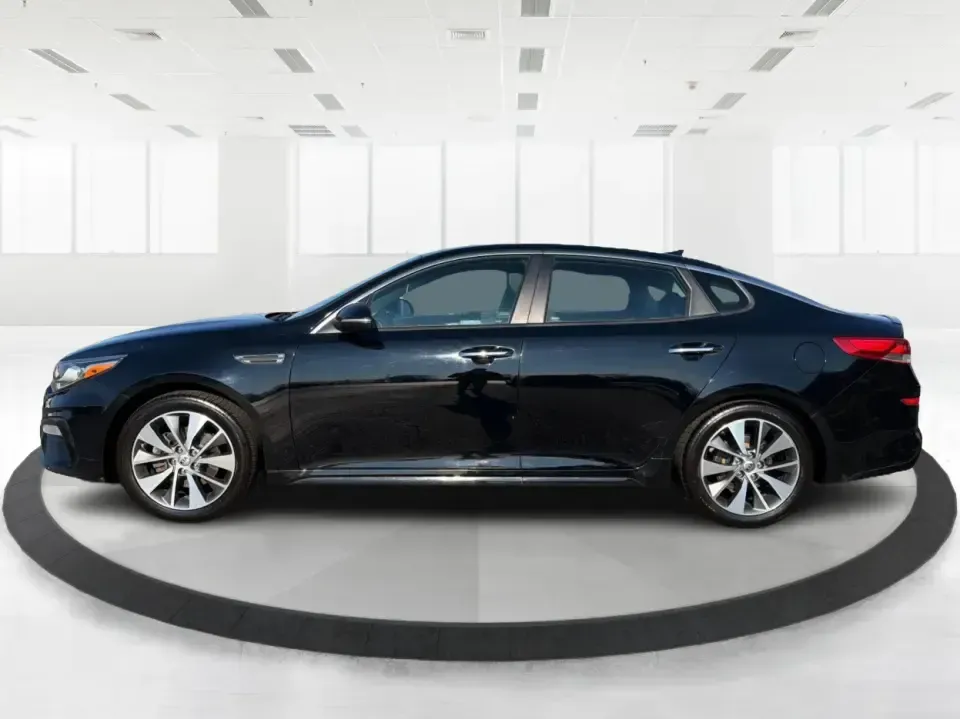 2019 Kia Optima S (5XXGT4L37KG) with an Theta II 2.4L I-4 gasoline direct injection engine, 6A transmission, located at 1099 N County Rd 25A, Troy, OH, 45373, (937) 908-9800, 40.057079, -84.212883 - Need a reliable commuter that still feels stylish for date night downtown, comfortable for weekend trips to Dayton, and efficient for the daily run up I75? This 2019 Kia Optima S in Ebony Black is a smart, budget-friendly sedan that fits real life-whether you're clocking a long work commute, shuttli - Photo#5