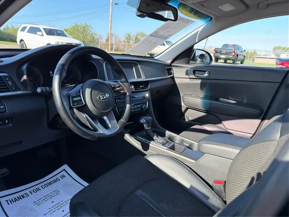 2019 Kia Optima S (5XXGT4L37KG) with an Theta II 2.4L I-4 gasoline direct injection engine, 6A transmission, located at 1099 N County Rd 25A, Troy, OH, 45373, (937) 908-9800, 40.057079, -84.212883 - Need a reliable commuter that still feels stylish for date night downtown, comfortable for weekend trips to Dayton, and efficient for the daily run up I75? This 2019 Kia Optima S in Ebony Black is a smart, budget-friendly sedan that fits real life-whether you're clocking a long work commute, shuttli - Photo#9