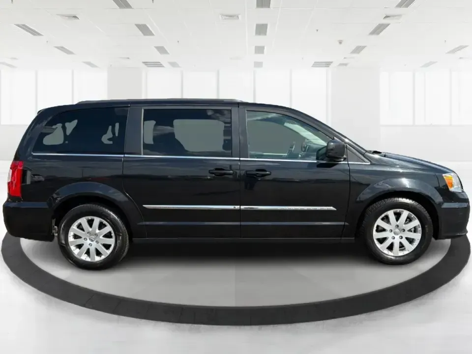 2016 Chrysler Town and Country Touring (2C4RC1BGXGR) with an Pentastar 3.6L V-6 DOHC engine, 6A transmission, located at 1230 East Main St, Xenia, OH, 45385, (937) 908-9800, 39.688026, -83.910172 - Life gets busy fast-school drop-offs, long commutes, weekend tournaments, and the occasional road trip to reset. The 2016 Chrysler Town and Country Touring is built for that real-life rhythm, giving you minivan practicality with comfort features that make every mile easier. Finished in Brilliant B - Photo#1