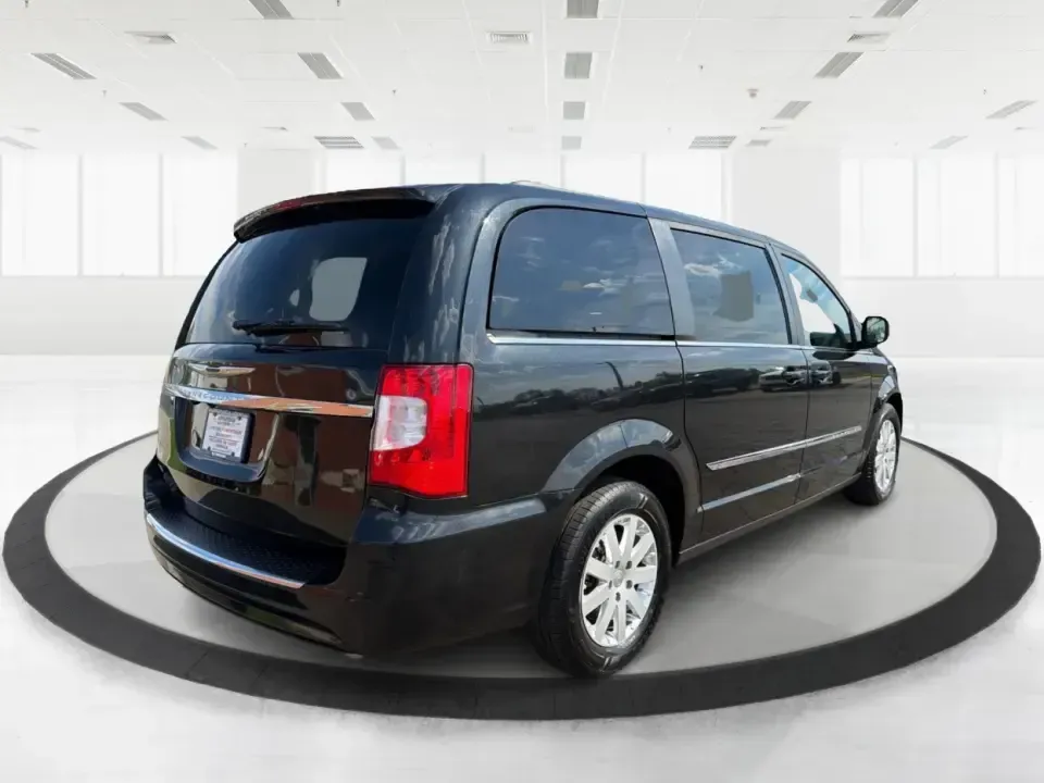 2016 Chrysler Town and Country Touring (2C4RC1BGXGR) with an Pentastar 3.6L V-6 DOHC engine, 6A transmission, located at 1230 East Main St, Xenia, OH, 45385, (937) 908-9800, 39.688026, -83.910172 - Life gets busy fast-school drop-offs, long commutes, weekend tournaments, and the occasional road trip to reset. The 2016 Chrysler Town and Country Touring is built for that real-life rhythm, giving you minivan practicality with comfort features that make every mile easier. Finished in Brilliant B - Photo#2
