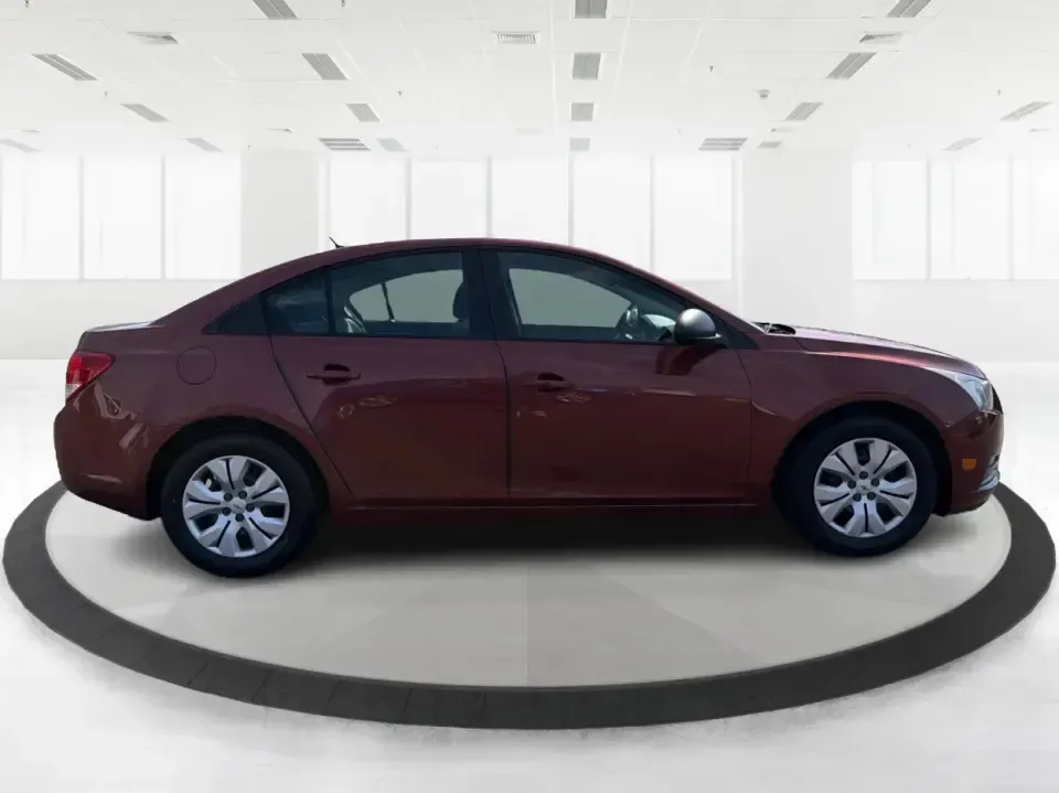 2013 Chevrolet Cruze LS Auto (1G1PA5SG2D7) with an 1.8L L4 DOHC 16V engine, 6-Speed Automatic transmission, located at 1099 N County Rd 25A, Troy, OH, 45373, (937) 908-9800, 40.057079, -84.212883 - Need a dependable commuter that sips fuel, fits five, and still feels comfortable for weekend errands and quick road trips? This **2013 Chevrolet Cruze LS Auto** is a smart pick for busy schedules in and around **Troy, Ohio**, whether you're heading down **I-75**, cruising **SR-55**, or making the d- Photo#1