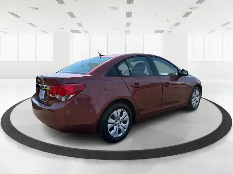 2013 Chevrolet Cruze LS Auto (1G1PA5SG2D7) with an 1.8L L4 DOHC 16V engine, 6-Speed Automatic transmission, located at 1099 N County Rd 25A, Troy, OH, 45373, (937) 908-9800, 40.057079, -84.212883 - Need a dependable commuter that sips fuel, fits five, and still feels comfortable for weekend errands and quick road trips? This **2013 Chevrolet Cruze LS Auto** is a smart pick for busy schedules in and around **Troy, Ohio**, whether you're heading down **I-75**, cruising **SR-55**, or making the d- Photo#2