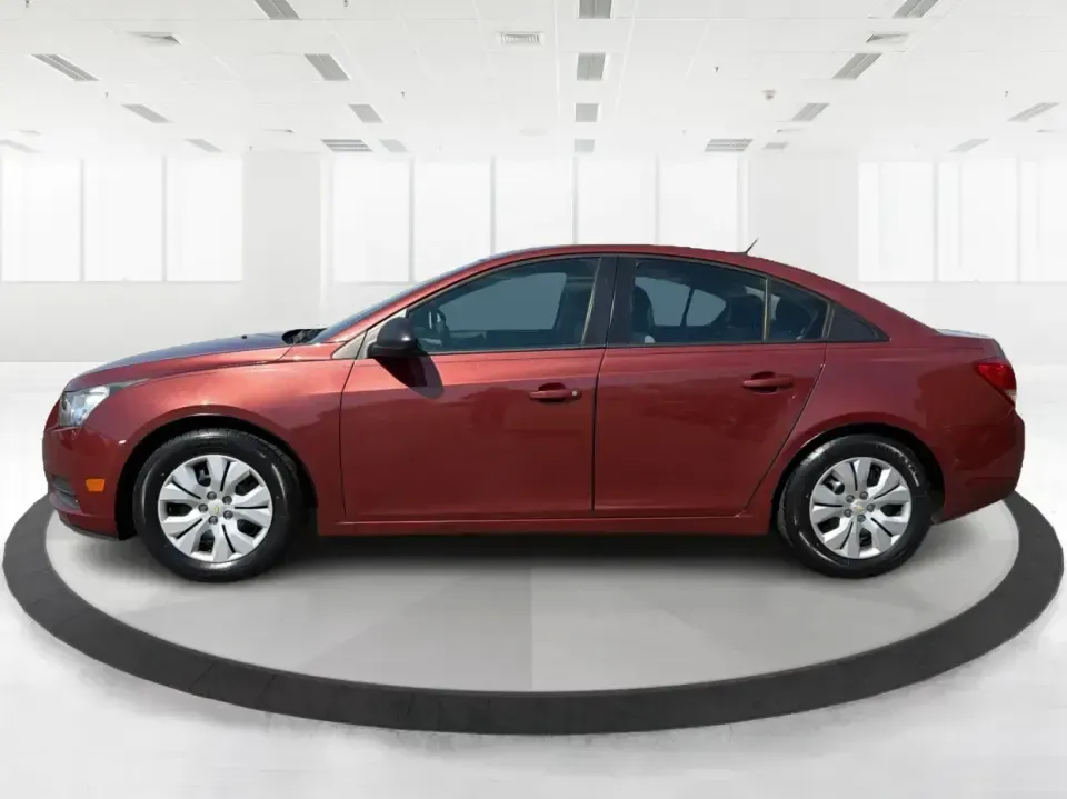 2013 Chevrolet Cruze LS Auto (1G1PA5SG2D7) with an 1.8L L4 DOHC 16V engine, 6-Speed Automatic transmission, located at 1099 N County Rd 25A, Troy, OH, 45373, (937) 908-9800, 40.057079, -84.212883 - Need a dependable commuter that sips fuel, fits five, and still feels comfortable for weekend errands and quick road trips? This **2013 Chevrolet Cruze LS Auto** is a smart pick for busy schedules in and around **Troy, Ohio**, whether you're heading down **I-75**, cruising **SR-55**, or making the d- Photo#5