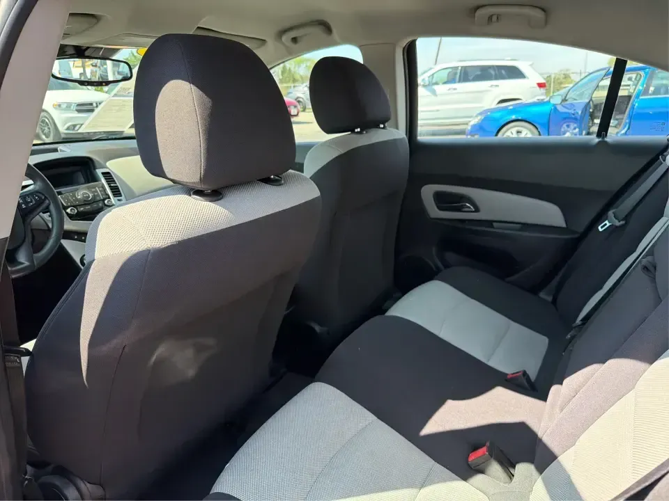 2013 Chevrolet Cruze LS Auto (1G1PA5SG2D7) with an 1.8L L4 DOHC 16V engine, 6-Speed Automatic transmission, located at 1099 N County Rd 25A, Troy, OH, 45373, (937) 908-9800, 40.057079, -84.212883 - Need a dependable commuter that sips fuel, fits five, and still feels comfortable for weekend errands and quick road trips? This **2013 Chevrolet Cruze LS Auto** is a smart pick for busy schedules in and around **Troy, Ohio**, whether you're heading down **I-75**, cruising **SR-55**, or making the d- Photo#10