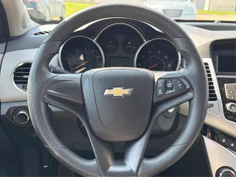 2013 Chevrolet Cruze LS Auto (1G1PA5SG2D7) with an 1.8L L4 DOHC 16V engine, 6-Speed Automatic transmission, located at 1099 N County Rd 25A, Troy, OH, 45373, (937) 908-9800, 40.057079, -84.212883 - Need a dependable commuter that sips fuel, fits five, and still feels comfortable for weekend errands and quick road trips? This **2013 Chevrolet Cruze LS Auto** is a smart pick for busy schedules in and around **Troy, Ohio**, whether you're heading down **I-75**, cruising **SR-55**, or making the d- Photo#16