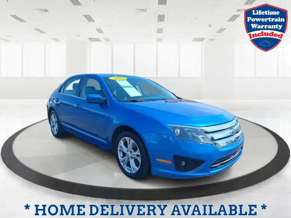 2012 Ford Fusion SE (3FAHP0HAXCR) with an 2.5L L4 DOHC 16V engine, located at 1099 N County Rd 25A, Troy, OH, 45373, (937) 908-9800, 40.057079, -84.212883 - Need a dependable sedan that makes everyday life easier-whether you're commuting down I-75 to Dayton, running errands around Troy, or planning a weekend drive past the Miami River and downtown's shops and festivals? This 2012 Ford Fusion SE in Blue Flame Metallic is a smart, comfortable choice for b - Photo#0