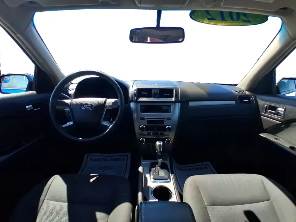 2012 Ford Fusion SE (3FAHP0HAXCR) with an 2.5L L4 DOHC 16V engine, located at 1099 N County Rd 25A, Troy, OH, 45373, (937) 908-9800, 40.057079, -84.212883 - Need a dependable sedan that makes everyday life easier-whether you're commuting down I-75 to Dayton, running errands around Troy, or planning a weekend drive past the Miami River and downtown's shops and festivals? This 2012 Ford Fusion SE in Blue Flame Metallic is a smart, comfortable choice for b - Photo#21