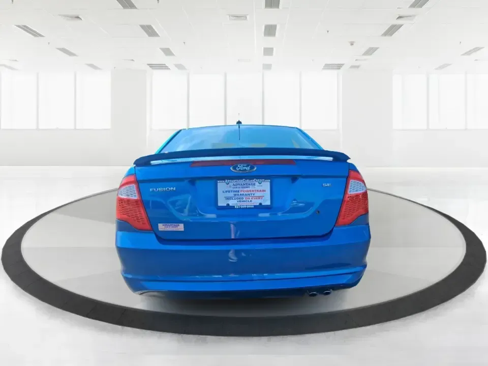 2012 Ford Fusion SE (3FAHP0HAXCR) with an 2.5L L4 DOHC 16V engine, located at 8750 N County Rd 25A, Piqua, OH, 45356, (937) 908-9800, 40.164391, -84.232513 - Need a dependable sedan that makes everyday life easier-whether you're commuting down I-75 to Dayton, running errands around Troy, or planning a weekend drive past the Miami River and downtown's shops and festivals? This 2012 Ford Fusion SE in Blue Flame Metallic is a smart, comfortable choice for b - Photo#3