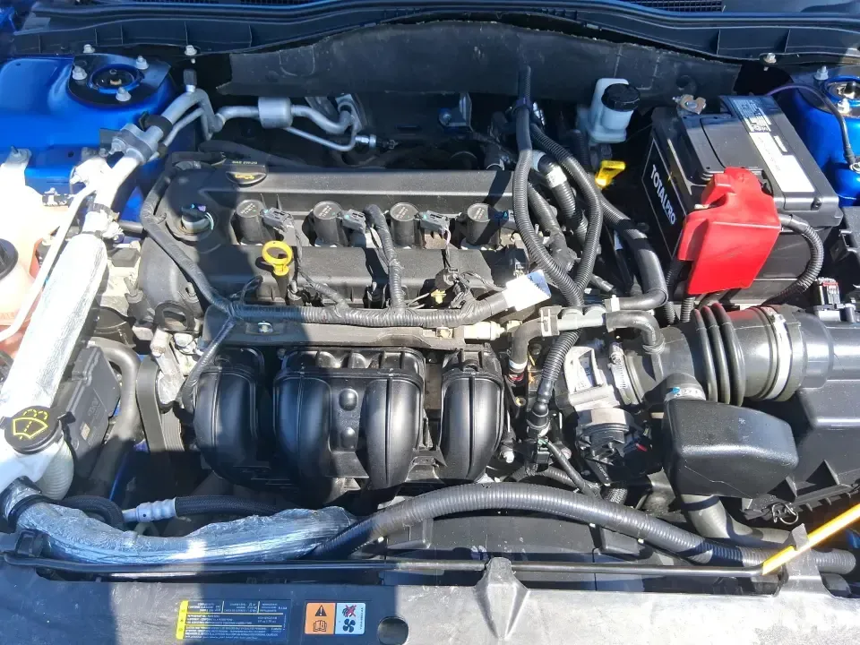 2012 Ford Fusion SE (3FAHP0HAXCR) with an 2.5L L4 DOHC 16V engine, located at 8750 N County Rd 25A, Piqua, OH, 45356, (937) 908-9800, 40.164391, -84.232513 - Need a dependable sedan that makes everyday life easier-whether you're commuting down I-75 to Dayton, running errands around Troy, or planning a weekend drive past the Miami River and downtown's shops and festivals? This 2012 Ford Fusion SE in Blue Flame Metallic is a smart, comfortable choice for b - Photo#11