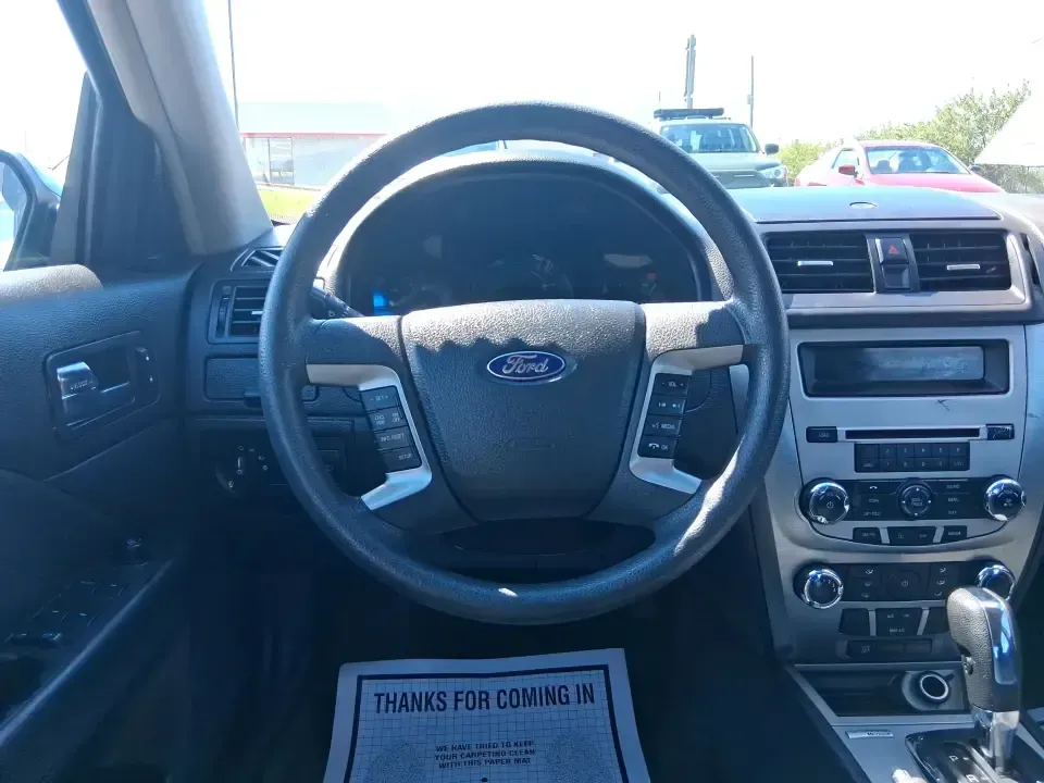 2012 Ford Fusion SE (3FAHP0HAXCR) with an 2.5L L4 DOHC 16V engine, located at 8750 N County Rd 25A, Piqua, OH, 45356, (937) 908-9800, 40.164391, -84.232513 - Need a dependable sedan that makes everyday life easier-whether you're commuting down I-75 to Dayton, running errands around Troy, or planning a weekend drive past the Miami River and downtown's shops and festivals? This 2012 Ford Fusion SE in Blue Flame Metallic is a smart, comfortable choice for b - Photo#16