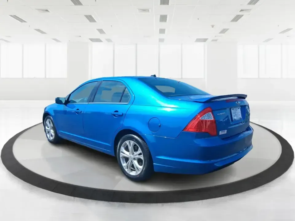2012 Ford Fusion SE (3FAHP0HAXCR) with an 2.5L L4 DOHC 16V engine, located at 401 Woodman Dr, Riverside, OH, 45431, (937) 908-9800, 39.760899, -84.123421 - Need a dependable sedan that makes everyday life easier-whether you're commuting down I-75 to Dayton, running errands around Troy, or planning a weekend drive past the Miami River and downtown's shops and festivals? This 2012 Ford Fusion SE in Blue Flame Metallic is a smart, comfortable choice for b - Photo#4