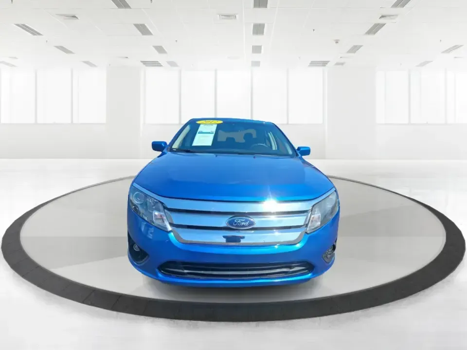 2012 Ford Fusion SE (3FAHP0HAXCR) with an 2.5L L4 DOHC 16V engine, located at 401 Woodman Dr, Riverside, OH, 45431, (937) 908-9800, 39.760899, -84.123421 - Need a dependable sedan that makes everyday life easier-whether you're commuting down I-75 to Dayton, running errands around Troy, or planning a weekend drive past the Miami River and downtown's shops and festivals? This 2012 Ford Fusion SE in Blue Flame Metallic is a smart, comfortable choice for b - Photo#7