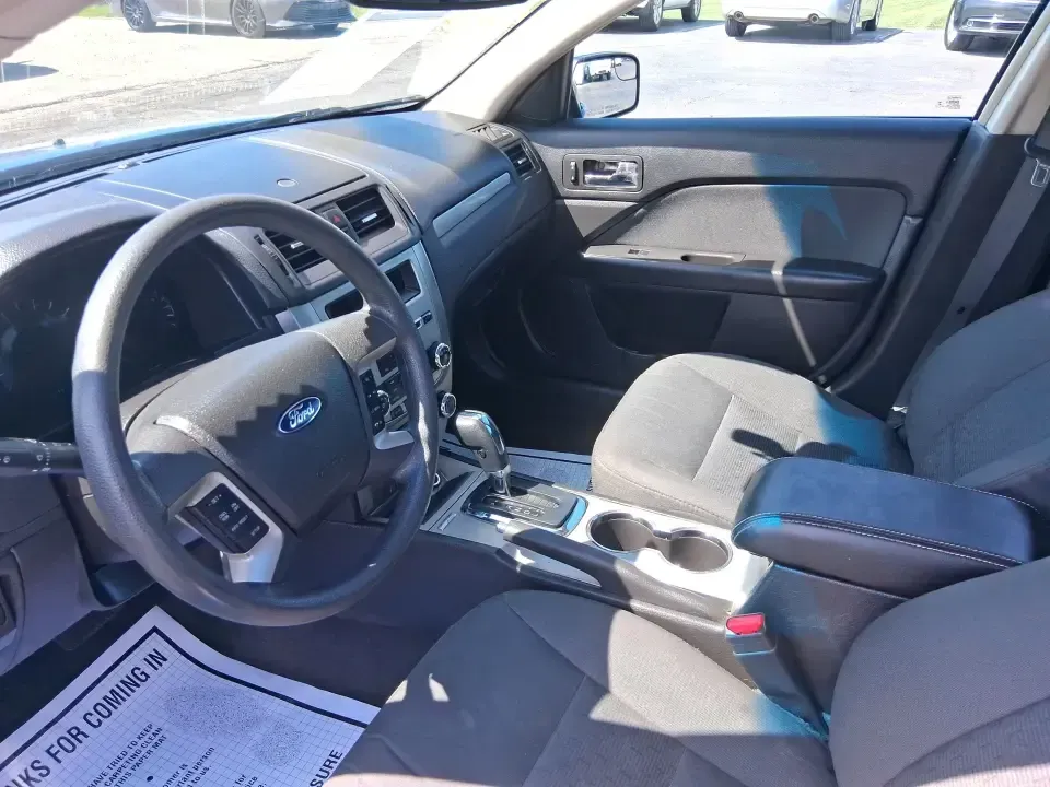 2012 Ford Fusion SE (3FAHP0HAXCR) with an 2.5L L4 DOHC 16V engine, located at 401 Woodman Dr, Riverside, OH, 45431, (937) 908-9800, 39.760899, -84.123421 - Need a dependable sedan that makes everyday life easier-whether you're commuting down I-75 to Dayton, running errands around Troy, or planning a weekend drive past the Miami River and downtown's shops and festivals? This 2012 Ford Fusion SE in Blue Flame Metallic is a smart, comfortable choice for b - Photo#9