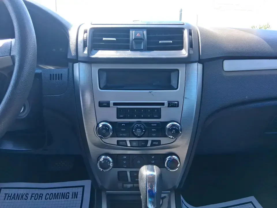 2012 Ford Fusion SE (3FAHP0HAXCR) with an 2.5L L4 DOHC 16V engine, located at 401 Woodman Dr, Riverside, OH, 45431, (937) 908-9800, 39.760899, -84.123421 - Need a dependable sedan that makes everyday life easier-whether you're commuting down I-75 to Dayton, running errands around Troy, or planning a weekend drive past the Miami River and downtown's shops and festivals? This 2012 Ford Fusion SE in Blue Flame Metallic is a smart, comfortable choice for b - Photo#13
