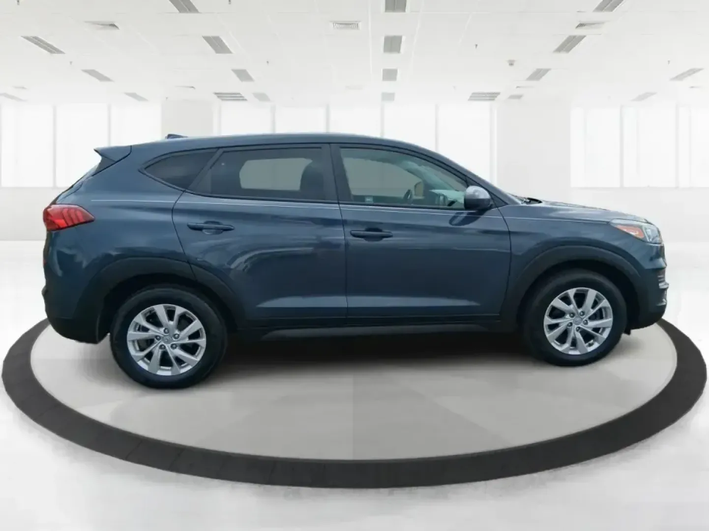2019 Hyundai Tucson SE (KM8J23A41KU) with an Nu 2L I-4 gasoline direct injection engine, 6A transmission, located at 8750 N County Rd 25A, Piqua, OH, 45356, (937) 908-9800, 40.164391, -84.232513 - Need a practical SUV that can handle the daily school run, a long commute up I75, and weekend trips to the Miami Valley without draining your budget? This 2019 Hyundai Tucson SE in eye-catching Dusk Blue is built for real life in Piqua, Ohio-easy to park, comfortable for passengers, and ready for ev - Photo#1