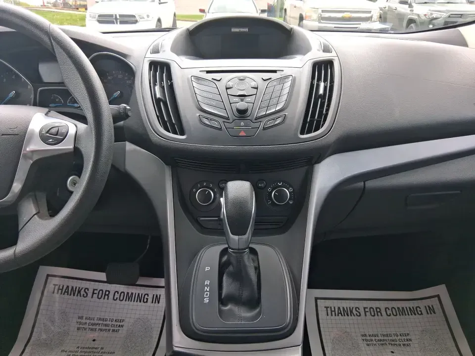 2015 Ford Escape SE (1FMCU9G91FU) with an 2.0L L4 DOHC 16V engine, 6-Speed Automatic transmission, located at 880 E. National Road, Vandalia, OH, 45377, (937) 908-9800, 39.891918, -84.183594 - Weekend getaways to Englewood MetroPark, snowy commutes down I75, and everyday school-and-grocery runs all feel easier when you've got an SUV that's sized right, confident in bad weather, and comfortable for the long haul. This **2015 Ford Escape SE 4WD** in **Ingot Silver** is a smart pick for driv - Photo#13