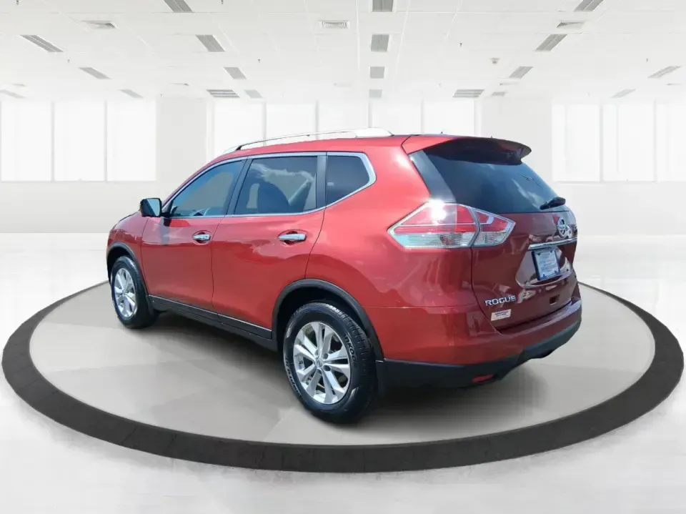 2015 Nissan Rogue SV (KNMAT2MV8FP) with an 2.5L I-4 DOHC engine, Continuously Variable Transmission transmission, located at 880 E. National Road, Vandalia, OH, 45377, (937) 908-9800, 39.891918, -84.183594 - Pack up the kids, load the cooler, and point the SUV toward your next weekend escape-this Cayenne Red 2015 Nissan Rogue SV is the kind of do-it-all crossover that fits real life in Vandalia, from school drop-offs and grocery runs to road trips up I75. With confident 4WD/AWD traction, a comfortable c - Photo#4