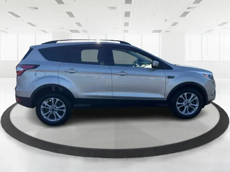 2018 Ford Escape SE (1FMCU0GD6JU) with an 1.5L L4 DOHC 16V engine, 6A transmission, located at 4508 South Dixie Dr, Moraine, OH, 45439, (937) 908-9800, 39.689976, -84.218452 - Pack up the kids, load the groceries, or point the nose toward a weekend getaway-this 2018 Ford Escape SE is the kind of compact SUV that fits real life in Moraine. With a comfortable cabin, smart tech, and easy-to-park size, it's ideal for long commutes up I75, quick errands along South Dixie Dr, o - Photo#1
