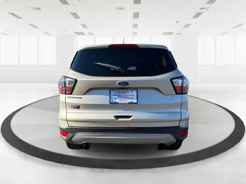 2018 Ford Escape SE (1FMCU0GD6JU) with an 1.5L L4 DOHC 16V engine, 6A transmission, located at 4508 South Dixie Dr, Moraine, OH, 45439, (937) 908-9800, 39.689976, -84.218452 - Pack up the kids, load the groceries, or point the nose toward a weekend getaway-this 2018 Ford Escape SE is the kind of compact SUV that fits real life in Moraine. With a comfortable cabin, smart tech, and easy-to-park size, it's ideal for long commutes up I75, quick errands along South Dixie Dr, o - Photo#3