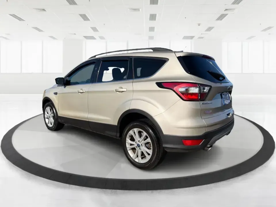 2018 Ford Escape SE FWD (1FMCU0GD6JU) with an 1.5L L4 DOHC 16V engine, 6A transmission, located at 1099 N County Rd 25A, Troy, OH, 45373, (937) 908-9800, 40.057079, -84.212883 - Weekday commute down I75, school drop-offs, and spontaneous weekend getaways to Charleston Falls Preserve all get easier in a compact SUV that fits real life. This 2018 Ford Escape SE FWD is a smart pick for Troy, Ohio drivers who want SUV versatility without the bulk-easy to park near downtown Troy- Photo#4