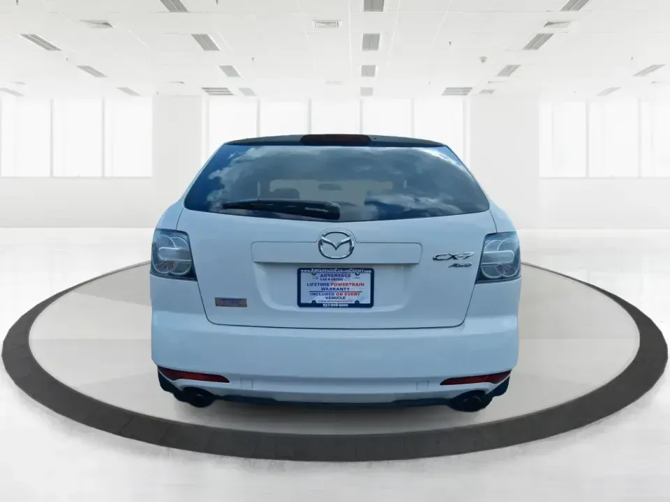 2010 Mazda CX-7 s Touring (JM3ER4W33A0) with an 2.3L I-4 gasoline direct injection engine, 6-Speed Automatic transmission, located at 1099 N County Rd 25A, Troy, OH, 45373, (937) 908-9800, 40.057079, -84.212883 - Picture your next weekend: loading up the cargo area for a day at Miami County Park, cruising up I75 for a quick getaway, or confidently handling Ohio's surprise rain and winter slush on the school run. This 2010 Mazda CX7 s Touring is the kind of sporty, practical SUV that fits real life in Troy-ea - Photo#3