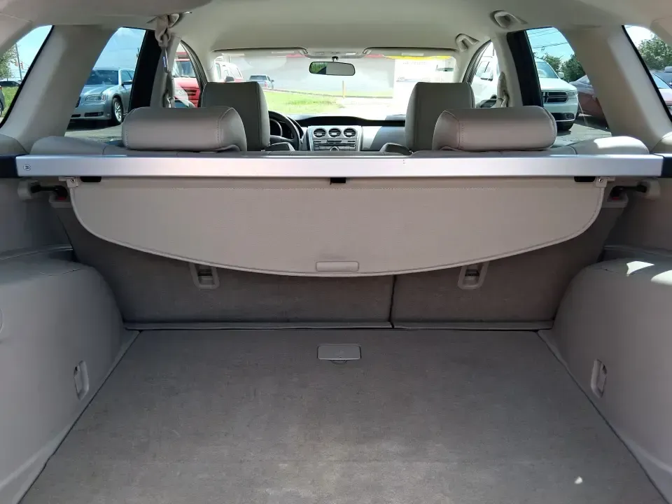 2010 Mazda CX-7 s Touring (JM3ER4W33A0) with an 2.3L I-4 gasoline direct injection engine, 6-Speed Automatic transmission, located at 1099 N County Rd 25A, Troy, OH, 45373, (937) 908-9800, 40.057079, -84.212883 - Picture your next weekend: loading up the cargo area for a day at Miami County Park, cruising up I75 for a quick getaway, or confidently handling Ohio's surprise rain and winter slush on the school run. This 2010 Mazda CX7 s Touring is the kind of sporty, practical SUV that fits real life in Troy-ea - Photo#12