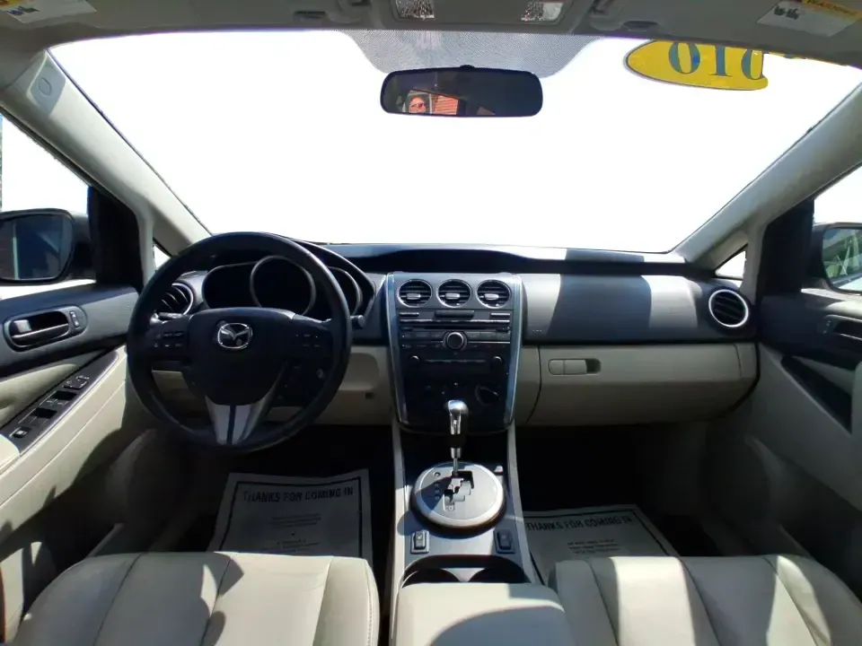 2010 Mazda CX-7 s Touring (JM3ER4W33A0) with an 2.3L I-4 gasoline direct injection engine, 6-Speed Automatic transmission, located at 1099 N County Rd 25A, Troy, OH, 45373, (937) 908-9800, 40.057079, -84.212883 - Picture your next weekend: loading up the cargo area for a day at Miami County Park, cruising up I75 for a quick getaway, or confidently handling Ohio's surprise rain and winter slush on the school run. This 2010 Mazda CX7 s Touring is the kind of sporty, practical SUV that fits real life in Troy-ea - Photo#20