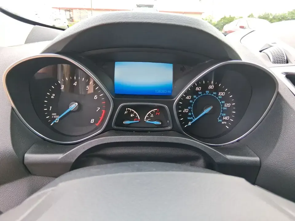 2014 Ford Escape Titanium (1FMCU9J99EU) with an 2.0L L4 DOHC 16V engine, 6-Speed Automatic transmission, located at 1099 N County Rd 25A, Troy, OH, 45373, (937) 908-9800, 40.057079, -84.212883 - Need one SUV that can handle an Ohio winter commute, school drop-offs, and a spontaneous weekend road trip to Hocking Hills without feeling like a compromise? This 2014 Ford Escape Titanium 4WD in sleek Tuxedo Black is built for real life in Troy-comfortable for long drives, confident in bad weather - Photo#15