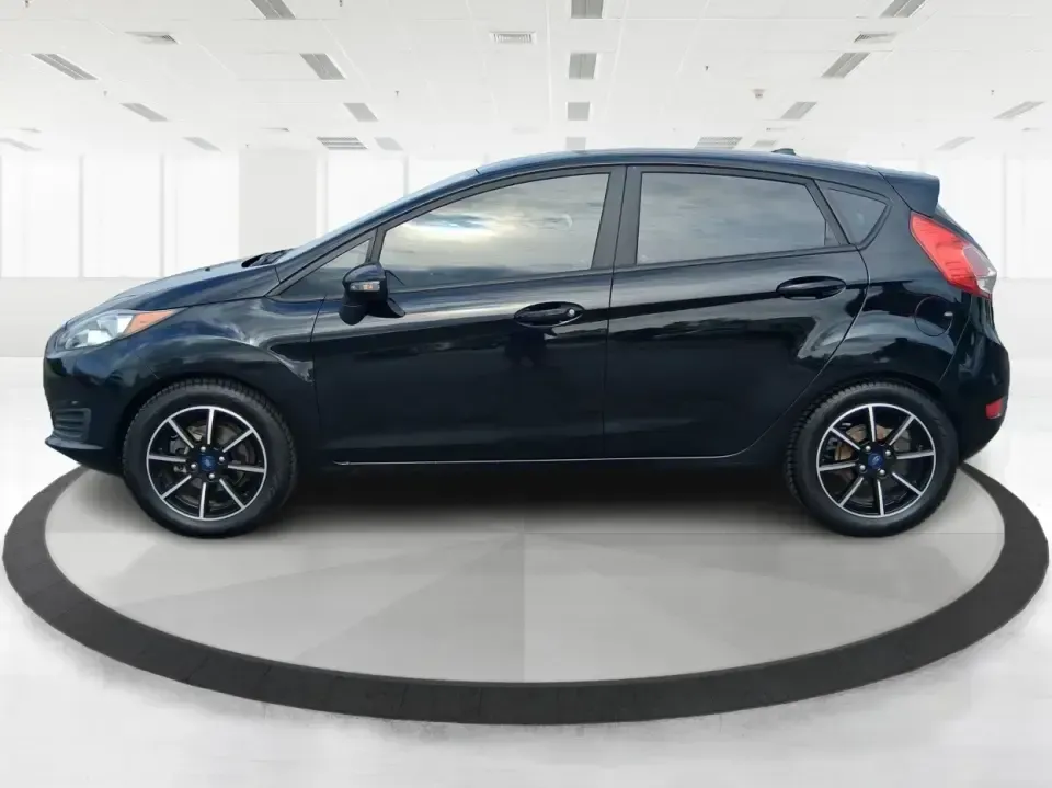 2019 Ford Fiesta SE (3FADP4EJ8KM) with an 1.6L I-4 DOHC engine, located at 401 Woodman Dr, Riverside, OH, 45431, (937) 908-9800, 39.760899, -84.123421 - Need a smart, easy-to-park hatchback for busy Riverside life-whether you're commuting down I-675, running errands near Wright-Patterson AFB, or squeezing into tight spots around The Greene in Beavercreek? This 2019 Ford Fiesta SE Hatchback in Shadow Black is built for real-world driving: efficient, - Photo#5