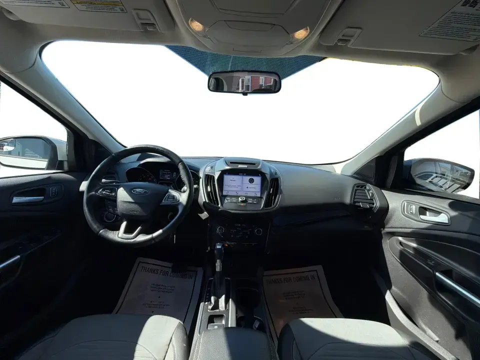 2017 Ford Escape SE (1FMCU0GD2HU) with an 1.5L L4 DOHC 16V engine, 6A transmission, located at 401 Woodman Dr, Riverside, OH, 45431, (937) 908-9800, 39.760899, -84.123421 - Picture a weekday that starts with a smooth commute up N County Rd 25A, turns into easy school drop-offs, and ends with a weekend escape to Indian Lake or a quick run down I75 for shopping and dinner-this 2017 Ford Escape SE is built for real life in and around Piqua, Ohio. Finished in standout Whit - Photo#21