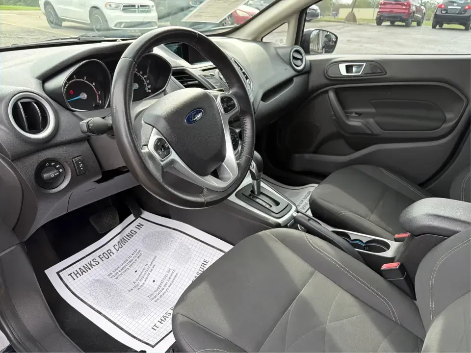 2016 Ford Fiesta SE (3FADP4EJ8GM) with an 1.6L L4 DOHC 16V engine, located at 8750 N County Rd 25A, Piqua, OH, 45356, (937) 908-9800, 40.164391, -84.232513 - Need a smart, easy-to-park hatchback that makes daily life simpler-whether you're commuting up I-75, running errands around downtown Piqua, or packing up for a weekend at Lock 9 Park? This 2016 Ford Fiesta SE Hatchback in Shadow Black delivers big practicality in a small, budget-friendly footprint, - Photo#9