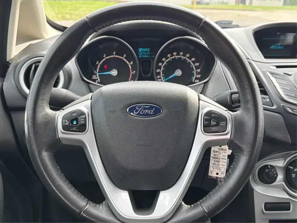 2016 Ford Fiesta SE (3FADP4EJ8GM) with an 1.6L L4 DOHC 16V engine, located at 8750 N County Rd 25A, Piqua, OH, 45356, (937) 908-9800, 40.164391, -84.232513 - Need a smart, easy-to-park hatchback that makes daily life simpler-whether you're commuting up I-75, running errands around downtown Piqua, or packing up for a weekend at Lock 9 Park? This 2016 Ford Fiesta SE Hatchback in Shadow Black delivers big practicality in a small, budget-friendly footprint, - Photo#16