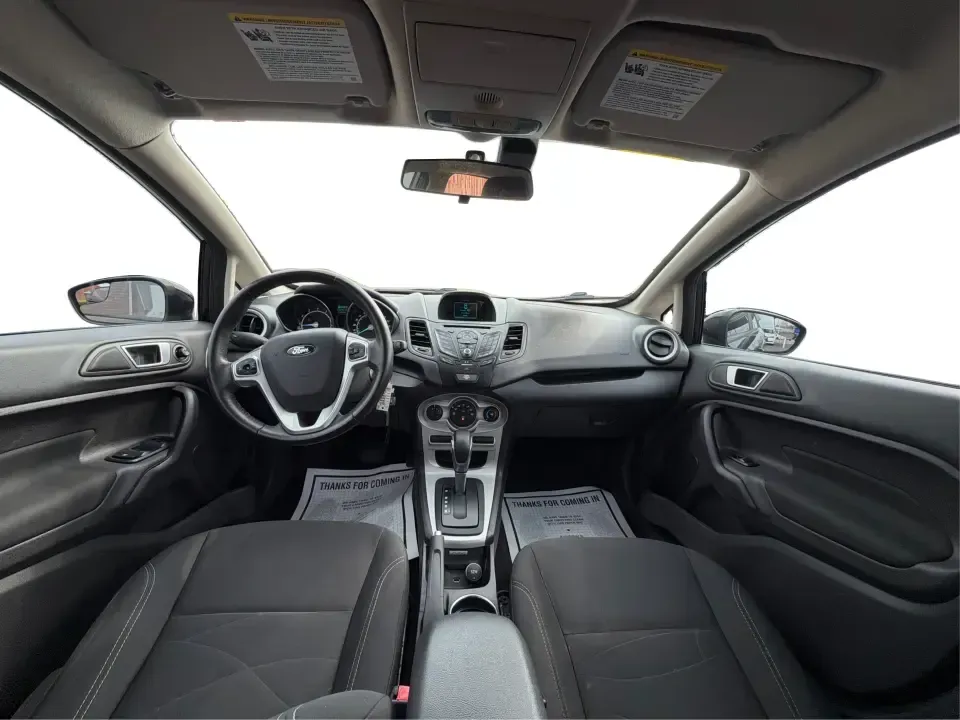 2016 Ford Fiesta SE (3FADP4EJ8GM) with an 1.6L L4 DOHC 16V engine, located at 8750 N County Rd 25A, Piqua, OH, 45356, (937) 908-9800, 40.164391, -84.232513 - Need a smart, easy-to-park hatchback that makes daily life simpler-whether you're commuting up I-75, running errands around downtown Piqua, or packing up for a weekend at Lock 9 Park? This 2016 Ford Fiesta SE Hatchback in Shadow Black delivers big practicality in a small, budget-friendly footprint, - Photo#21