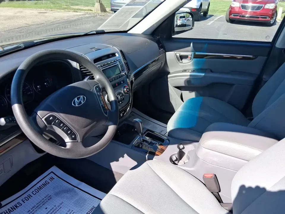 2012 Hyundai Santa Fe GLS (5XYZGDABXCG) with an 2.4L I-4 DOHC engine, 6-Speed Automatic transmission, located at 8750 N County Rd 25A, Piqua, OH, 45356, (937) 908-9800, 40.164391, -84.232513 - Pack up the kids, load the groceries, and head out for a weekend escape-this 2012 Hyundai Santa Fe GLS is the kind of SUV that fits real life in West Central Ohio. Whether you're commuting up N County Rd 25A toward Troy, running errands near downtown Piqua, or planning a road trip out past the Great - Photo#9
