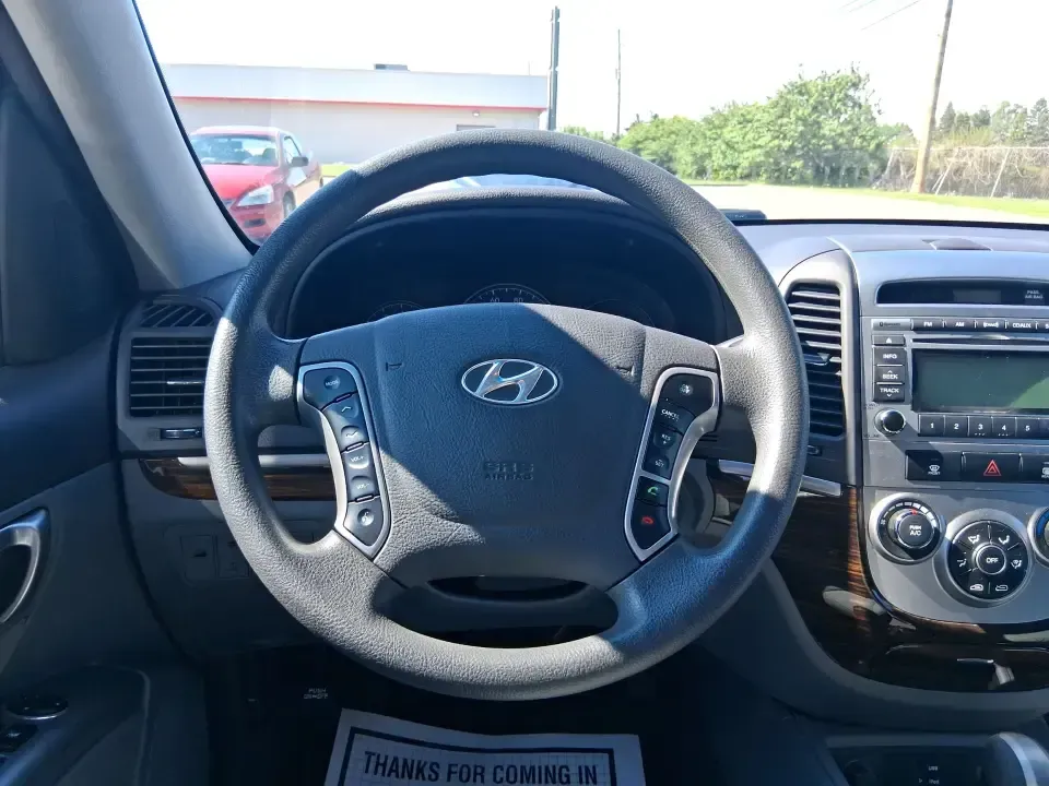 2012 Hyundai Santa Fe GLS (5XYZGDABXCG) with an 2.4L I-4 DOHC engine, 6-Speed Automatic transmission, located at 8750 N County Rd 25A, Piqua, OH, 45356, (937) 908-9800, 40.164391, -84.232513 - Pack up the kids, load the groceries, and head out for a weekend escape-this 2012 Hyundai Santa Fe GLS is the kind of SUV that fits real life in West Central Ohio. Whether you're commuting up N County Rd 25A toward Troy, running errands near downtown Piqua, or planning a road trip out past the Great - Photo#16