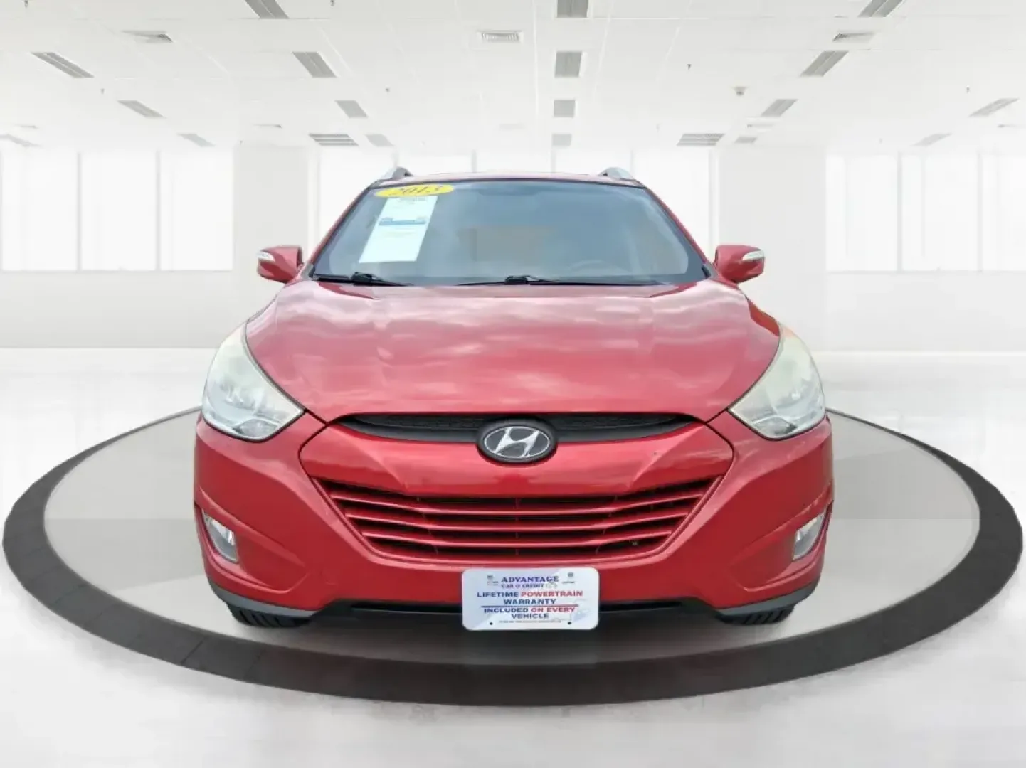 2013 Hyundai Tucson GLS (KM8JUCAC7DU) with an Theta II 2.4L I-4 DOHC engine, 6-Speed Automatic transmission, located at 8750 N County Rd 25A, Piqua, OH, 45356, (937) 908-9800, 40.164391, -84.232513 - Need a dependable SUV that can handle Ohio weather, school drop-offs, and weekend getaways without stretching your budget? This 2013 Hyundai Tucson GLS in eye-catching Garnet Red is built for real life-comfortable for daily commuting, confident on slick winter roads, and practical for everything fro - Photo#7