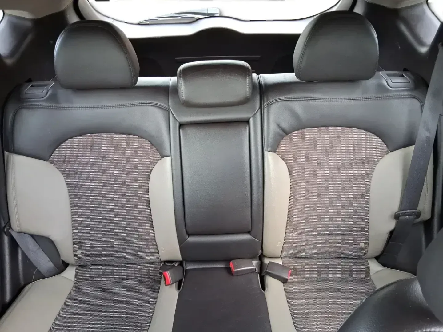 2013 Hyundai Tucson GLS (KM8JUCAC7DU) with an Theta II 2.4L I-4 DOHC engine, 6-Speed Automatic transmission, located at 8750 N County Rd 25A, Piqua, OH, 45356, (937) 908-9800, 40.164391, -84.232513 - Need a dependable SUV that can handle Ohio weather, school drop-offs, and weekend getaways without stretching your budget? This 2013 Hyundai Tucson GLS in eye-catching Garnet Red is built for real life-comfortable for daily commuting, confident on slick winter roads, and practical for everything fro - Photo#14